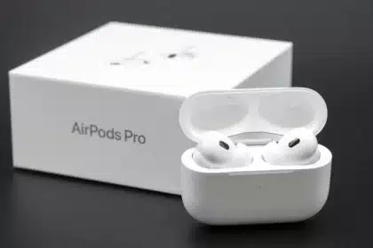 AirPods Pro with charging case in front of the box.