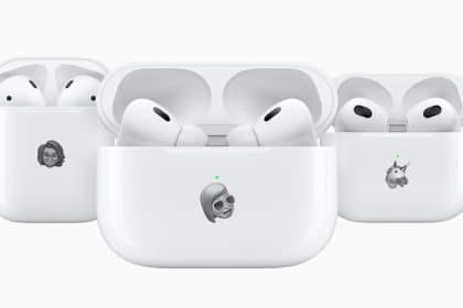 Three Apple AirPods cases with custom Memoji designs.