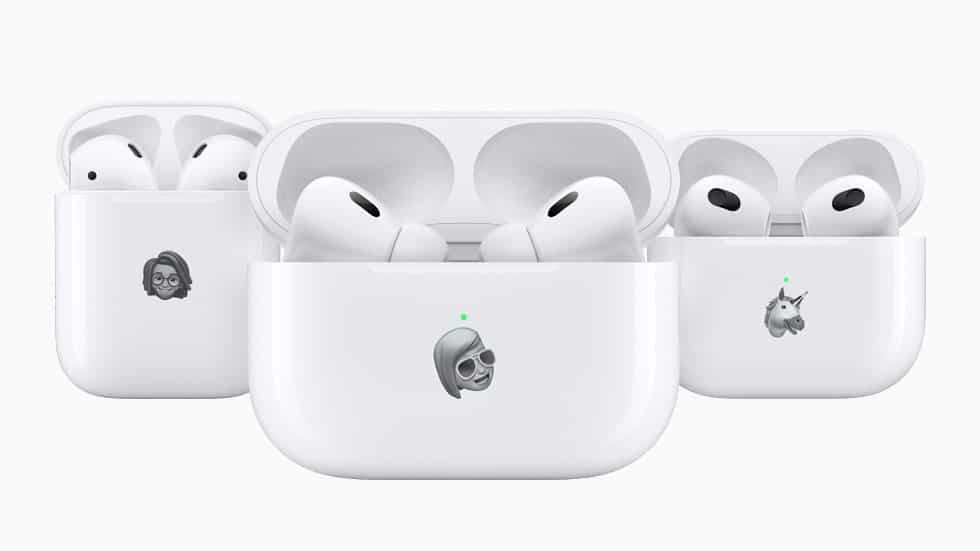 Three Apple AirPods cases with custom Memoji designs.