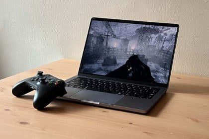 Gaming on a MacBook with a connected controller.