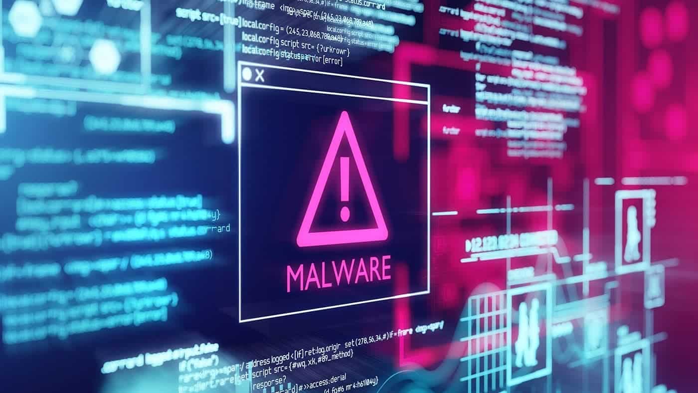 A warning sign with the word "MALWARE" on a digital screen.