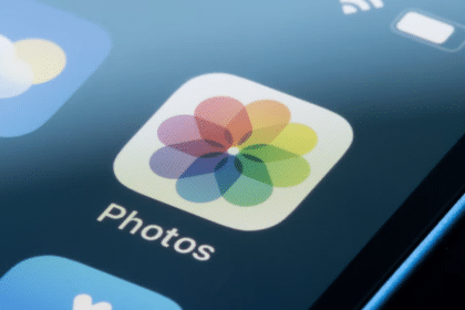 Close-up of the Photos app icon on an iPhone screen.