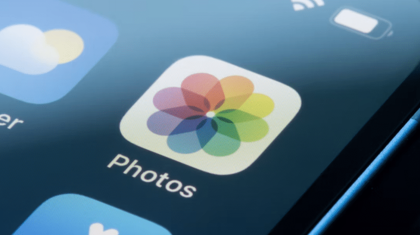 Close-up of the Photos app icon on an iPhone screen.