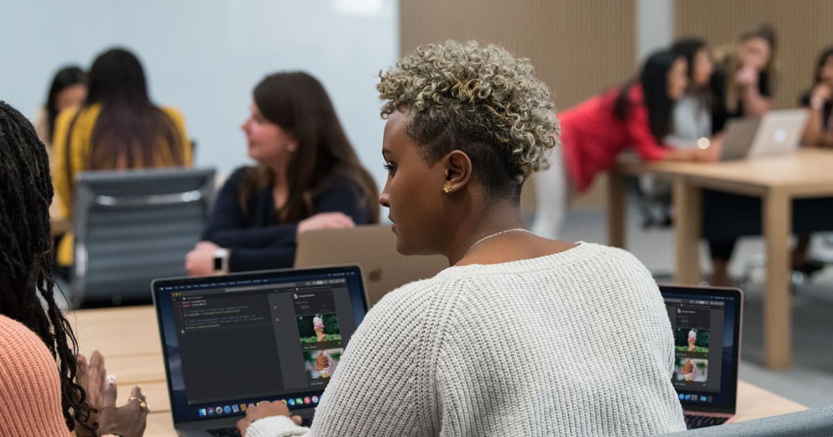 Women at Apple’s Entrepreneur Camp, focused on app development.