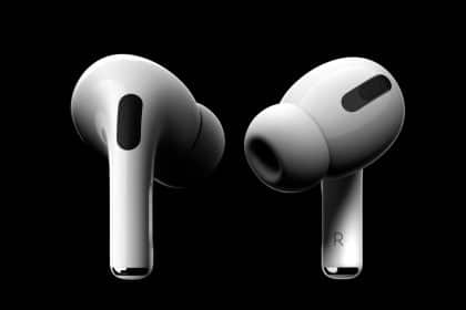 Two white AirPods Pro earbuds on a black background.