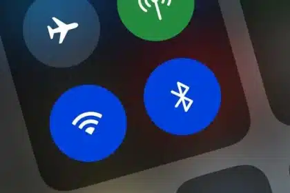 Close-up of a phone screen showing the Bluetooth icon.