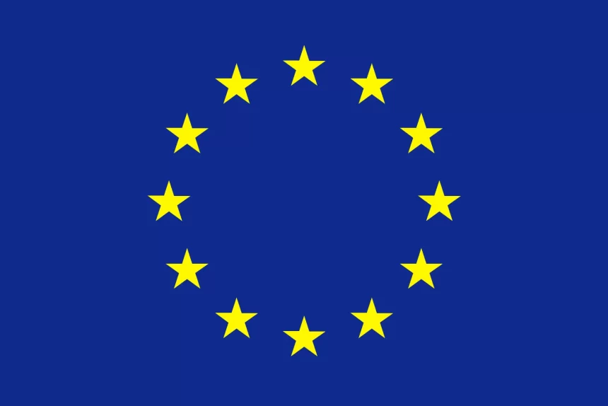 EU flag with yellow stars on a blue background.