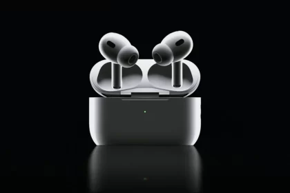 AirPods Pro 2 in charging case, on a black background.