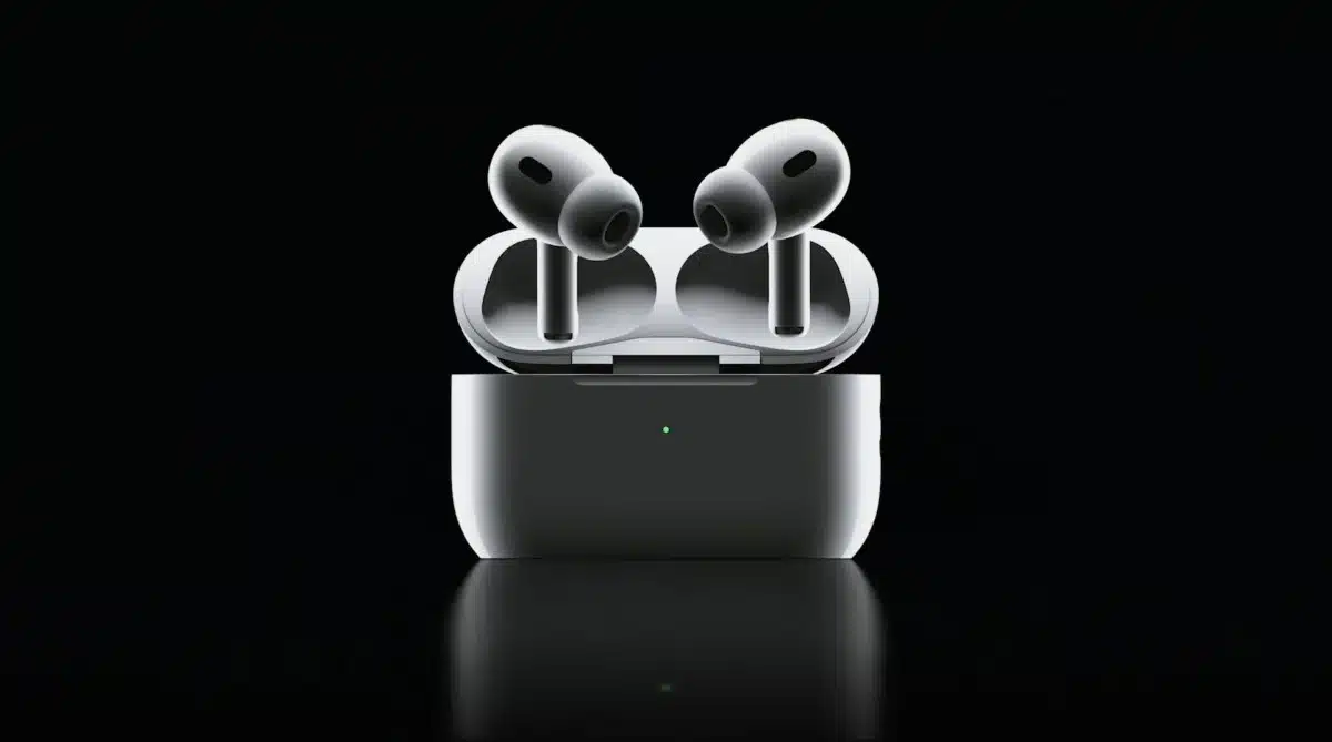 AirPods Pro 2 in charging case, on a black background.