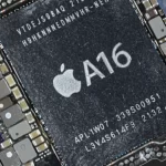 Close-up image of an Apple A16 chip on a circuit board.