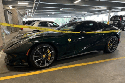 Recovered stolen Ferrari 812 GTS wrapped in police tape.