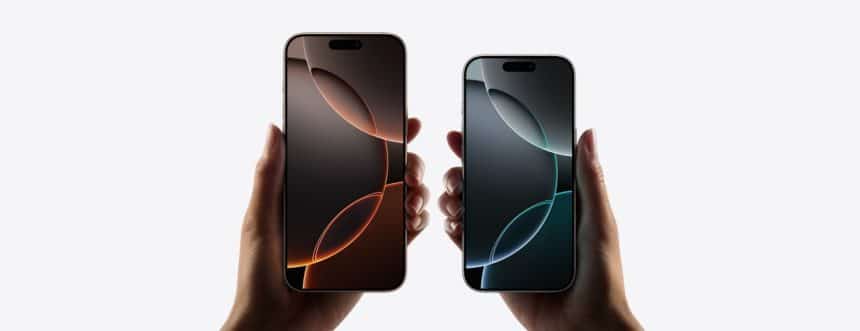 Two hands holding iPhone 16 Pro models with displays.