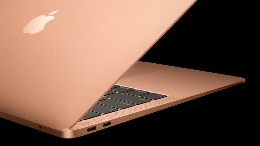 Side view of a MacBook Air in gold color.