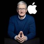 Apple CEO Tim Cook with the Apple logo in the background.