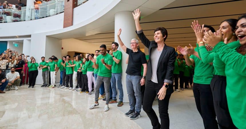 Apple team celebrating store opening in India.