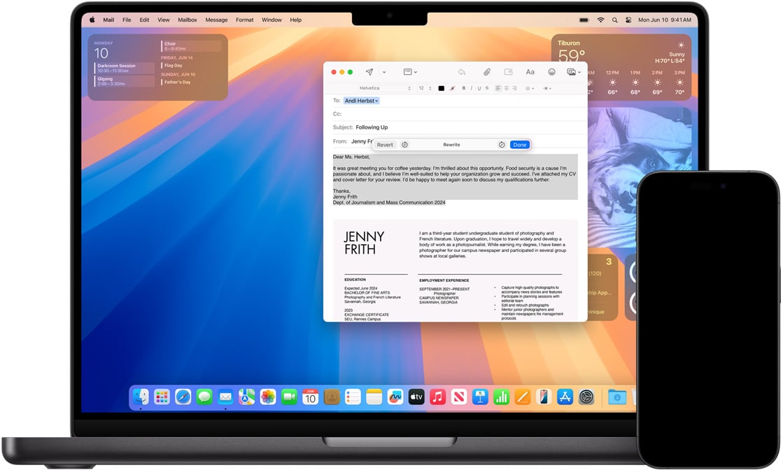 A MacBook displaying an email draft on the screen, with an iPhone beside it.