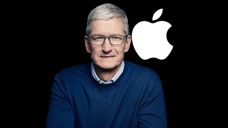 Tim Cook in front of the Apple logo.