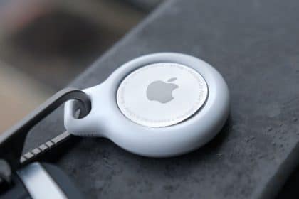 Apple AirTag attached to a keychain.