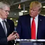 Tim Cook and Donald Trump at a factory.