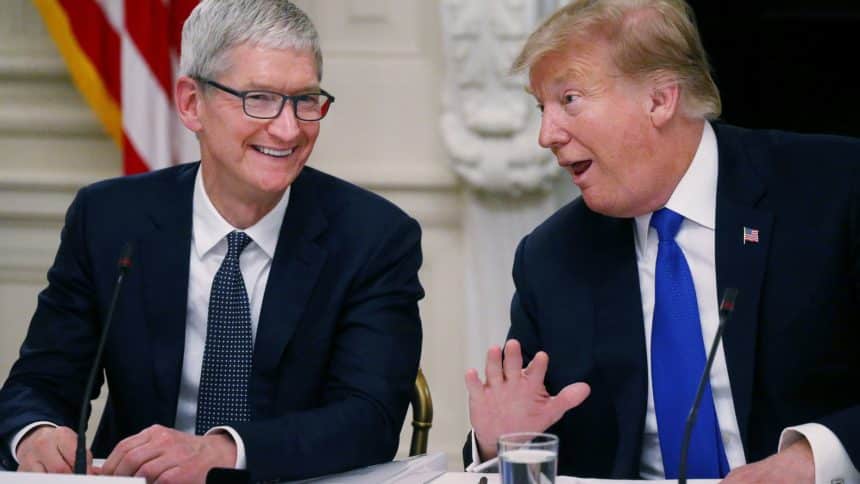 Tim Cook and Donald Trump sharing a conversation.