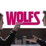 George Clooney and Brad Pitt in Wolfs movie poster.