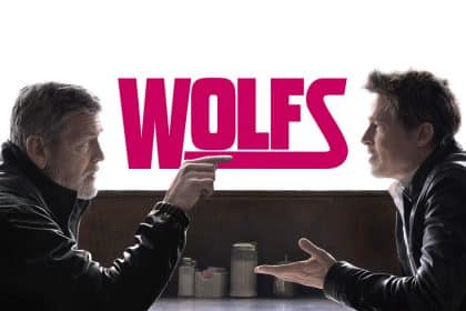 George Clooney and Brad Pitt in Wolfs movie poster.