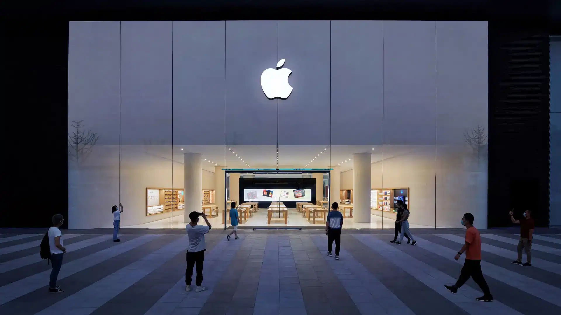 Apple flagship store with a glass facade.