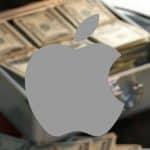 Apple logo over a pile of cash in a briefcase.