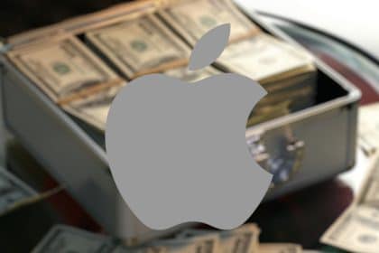 Apple logo over a pile of cash in a briefcase.