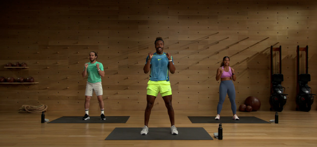 Group workout session led by an Apple Fitness+ trainer.