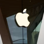 Apple logo on a building facade.