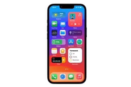 iPhone showcasing the iOS 18.3 home screen with updated widgets and colorful icons.