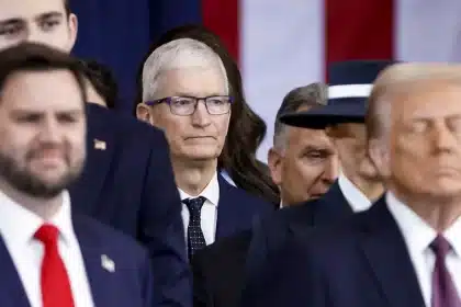 Tim Cook attending a formal event with Donald Trump and others.