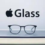 Apple Glass concept image with eyeglasses on a laptop.