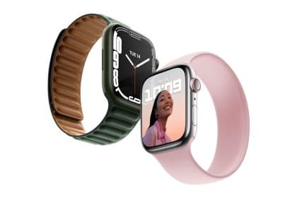 Two Apple Watches with stylish bands, displaying the time and interface.