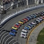 NASCAR cars lined up at the start of the Daytona 500 race.