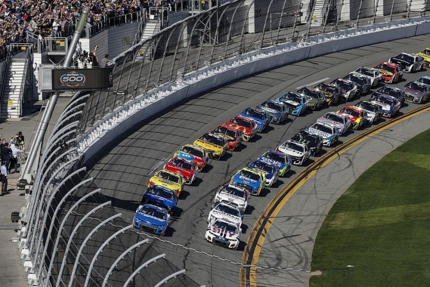 NASCAR cars lined up at the start of the Daytona 500 race.