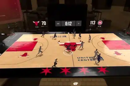 Apple Vision Pro displaying an NBA game in 3D tabletop mode with real-time player movements.