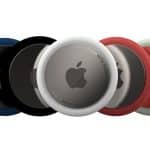 A set of Apple AirTags in various colours, including black, white, red, and green.