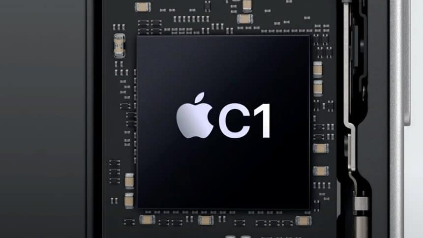 Close-up of Apple's C1 modem chip on a circuit board.