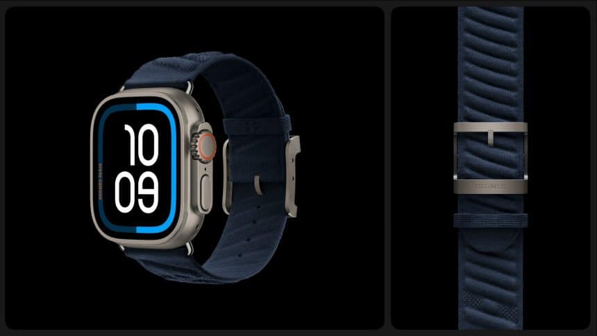 Apple Watch Ultra with a navy blue Hermes band and titanium buckle.