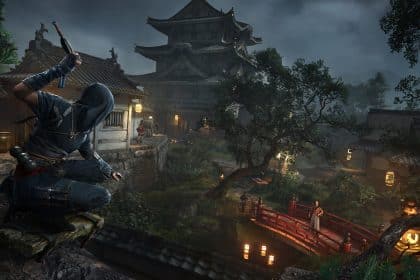 A hooded Shinobi assassin crouches on a rooftop at night, overlooking a Japanese castle.