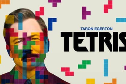 Movie poster for Tetris featuring Taron Egerton with colourful Tetris blocks overlaying his face.