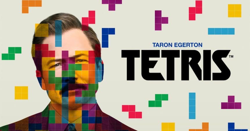 Movie poster for Tetris featuring Taron Egerton with colourful Tetris blocks overlaying his face.