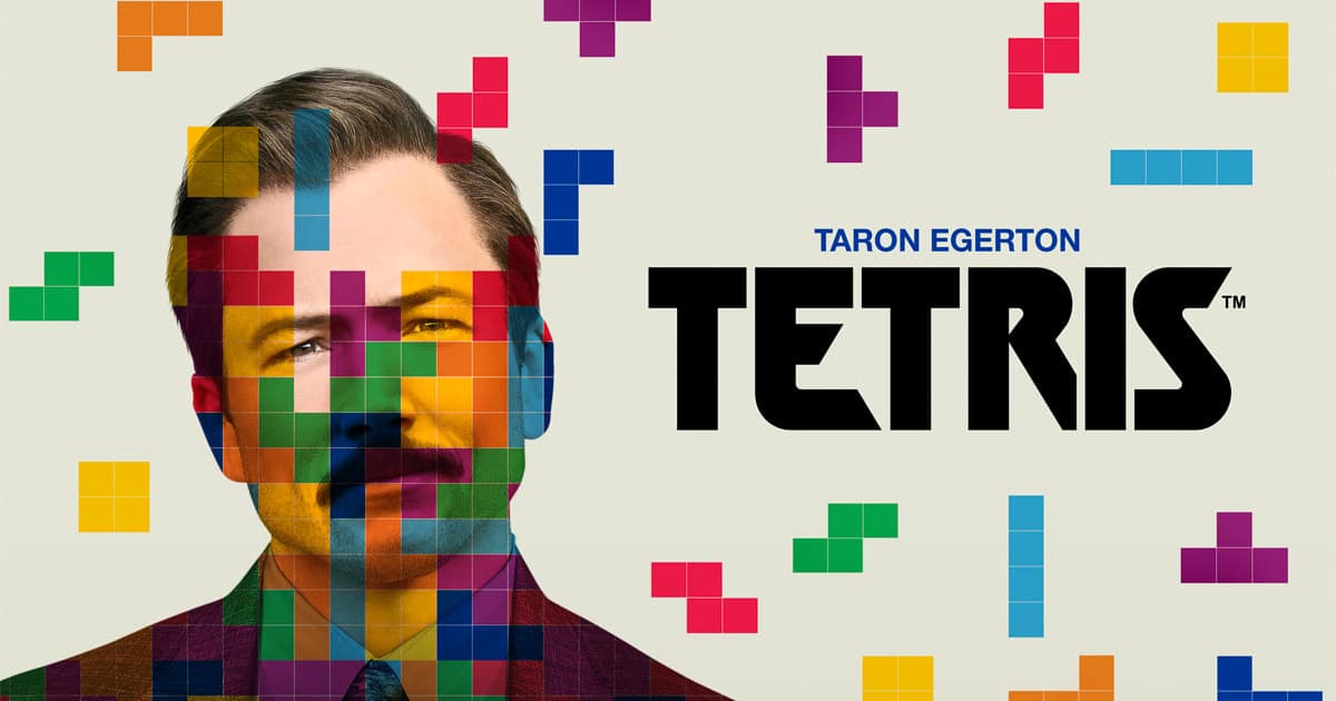 Movie poster for Tetris featuring Taron Egerton with colourful Tetris blocks overlaying his face.