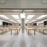 Apple Store in the UK displaying iPhones and other Apple products.